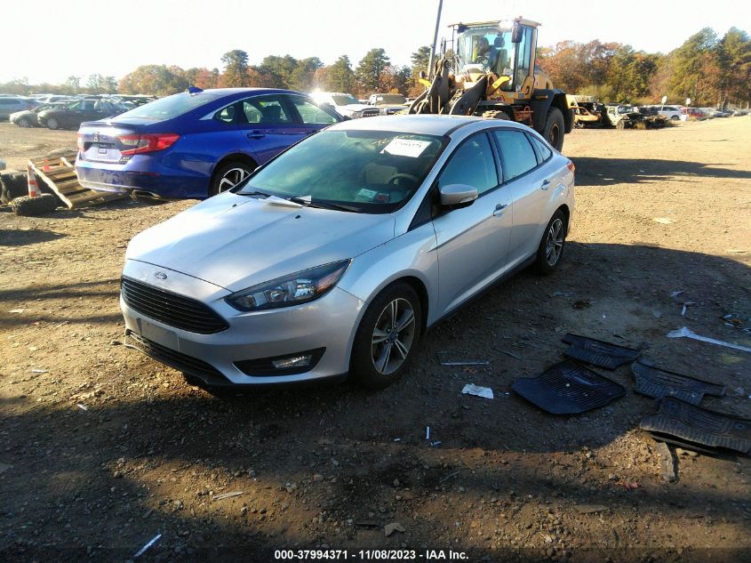 2018 Ford Focus Se VIN: 1FADP3FE2JL318418 Lot: 40759033