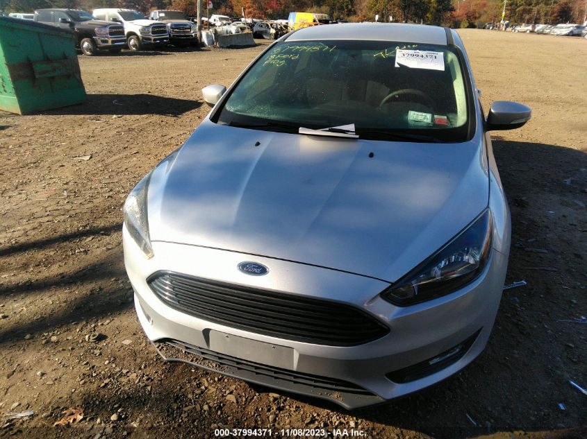 2018 Ford Focus Se VIN: 1FADP3FE2JL318418 Lot: 40759033