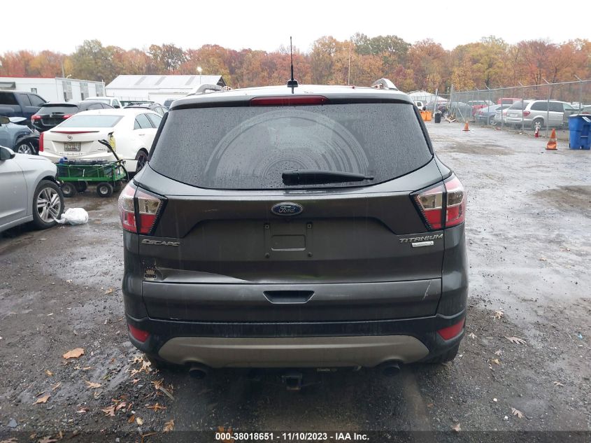 2017 Ford Escape Titanium VIN: 1FMCU0J97HUC13302 Lot: 38018651