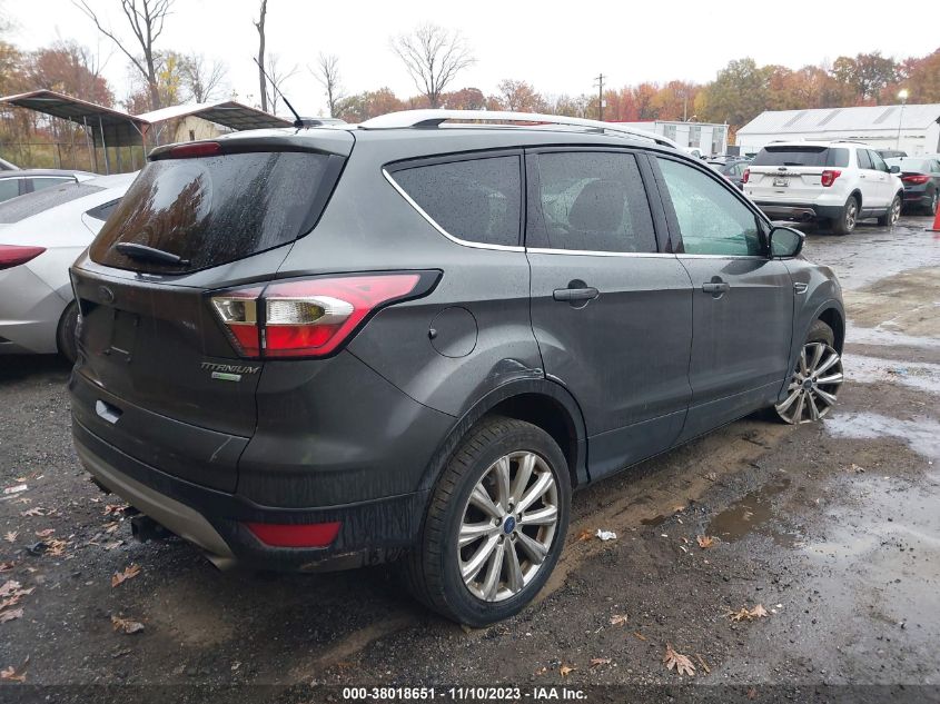 2017 Ford Escape Titanium VIN: 1FMCU0J97HUC13302 Lot: 38018651