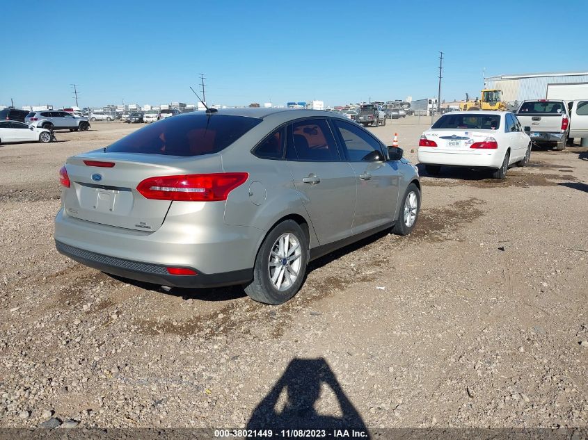 2015 Ford Focus Se VIN: 1FADP3F20FL307995 Lot: 38021449