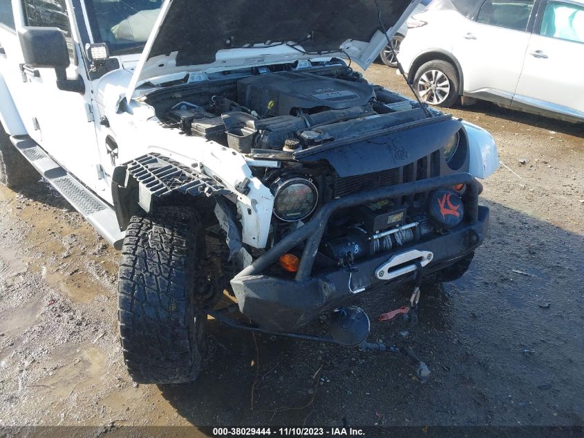 2013 Jeep Wrangler Unlimited Sahara VIN: 1C4BJWEG4DL641591 Lot: 38029444