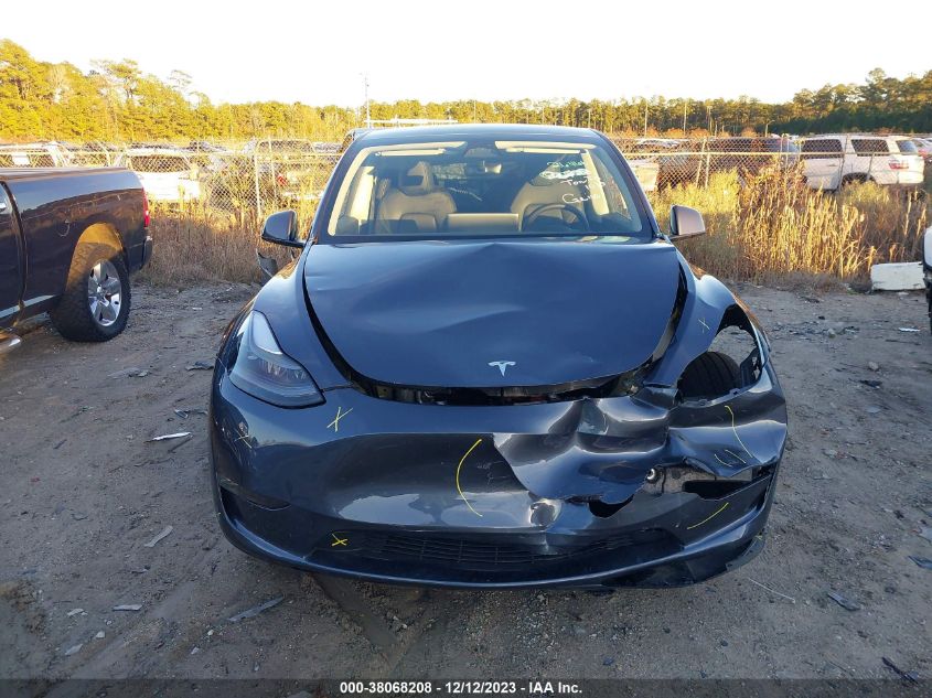 2023 Tesla Model Y Awd/Long Range Dual Motor All-Wheel Drive VIN: 7SAYGDEE2PF701311 Lot: 38068208