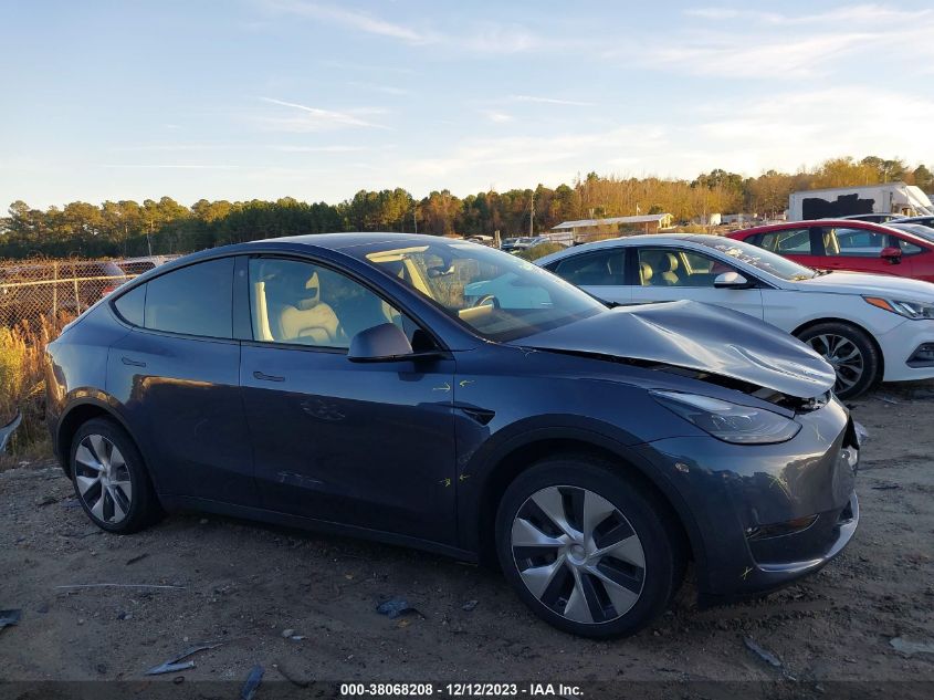 2023 Tesla Model Y Awd/Long Range Dual Motor All-Wheel Drive VIN: 7SAYGDEE2PF701311 Lot: 38068208