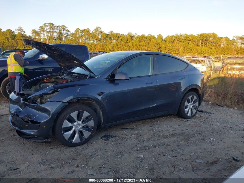2023 Tesla Model Y Awd/Long Range Dual Motor All-Wheel Drive VIN: 7SAYGDEE2PF701311 Lot: 38068208