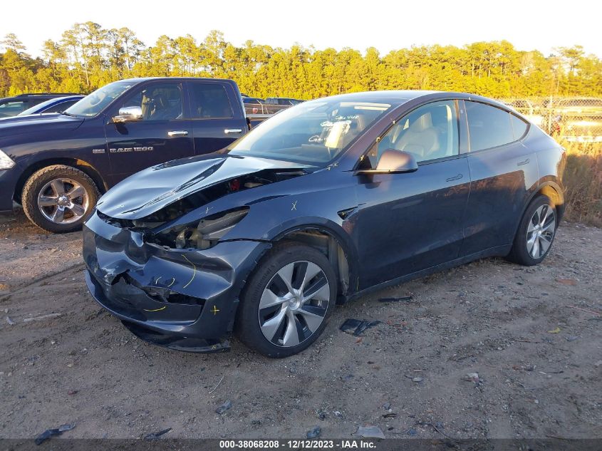 2023 Tesla Model Y Awd/Long Range Dual Motor All-Wheel Drive VIN: 7SAYGDEE2PF701311 Lot: 38068208