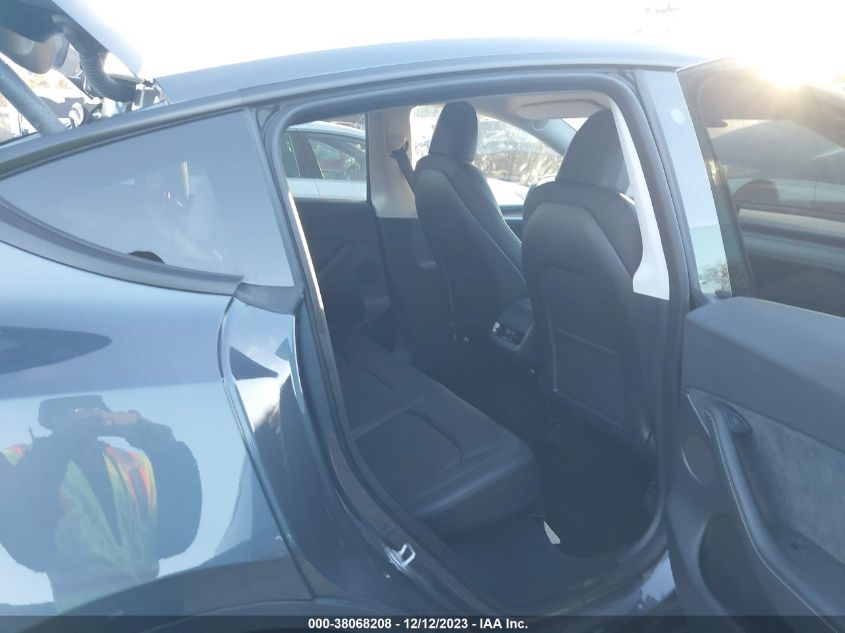 2023 Tesla Model Y Awd/Long Range Dual Motor All-Wheel Drive VIN: 7SAYGDEE2PF701311 Lot: 38068208