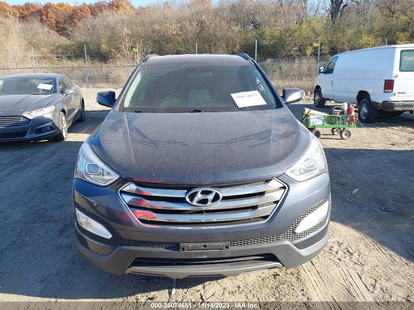 2014 Hyundai Santa Fe Sport 2.4L VIN: 5XYZUDLB8EG217717 Lot: 38074651
