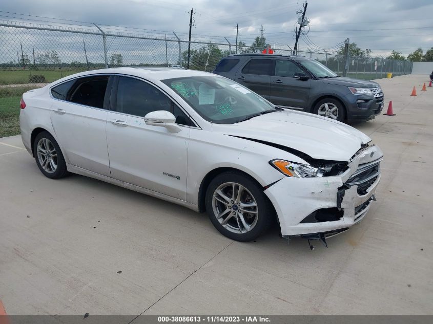 2015 Ford Fusion Hybrid Titanium VIN: 3FA6P0RU6FR104244 Lot: 38086613