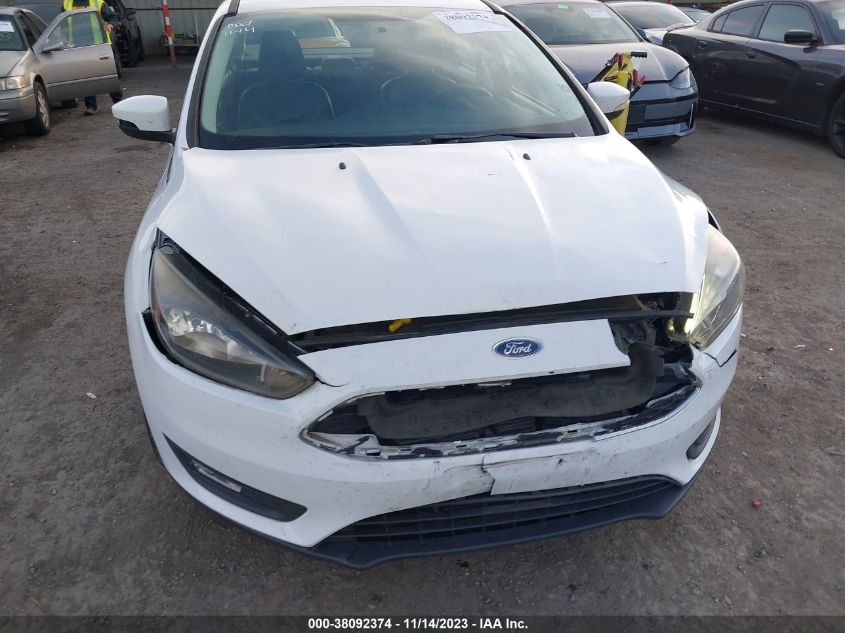 2016 Ford Focus Se VIN: 1FADP3F23GL363446 Lot: 38092374