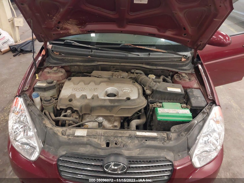 2006 Hyundai Accent Gls VIN: KMHCN46C06U052975 Lot: 38096072