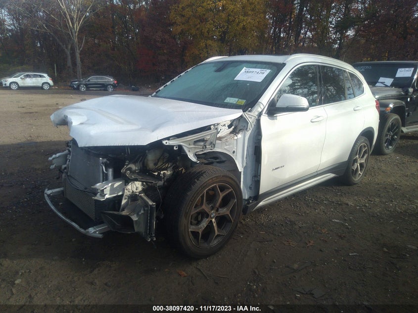 2018 BMW X1 xDrive28I VIN: WBXHT3C39J5K32055 Lot: 38097420