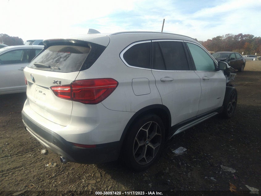 2018 BMW X1 xDrive28I VIN: WBXHT3C39J5K32055 Lot: 38097420