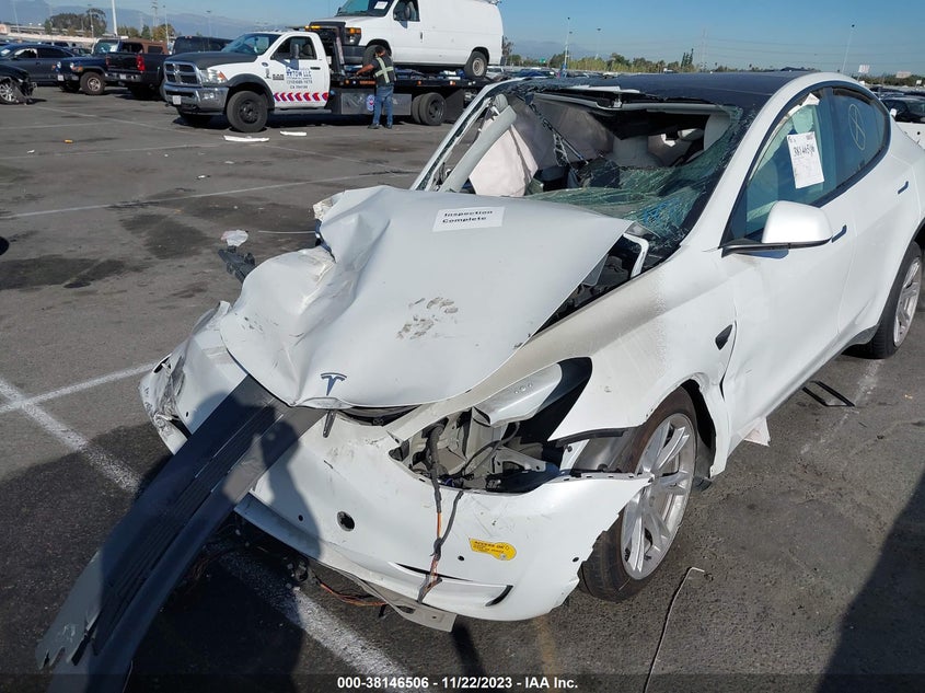 2022 Tesla Model Y Long Range Dual Motor All-Wheel Drive VIN: 7SAYGDEE3NF554851 Lot: 38146506