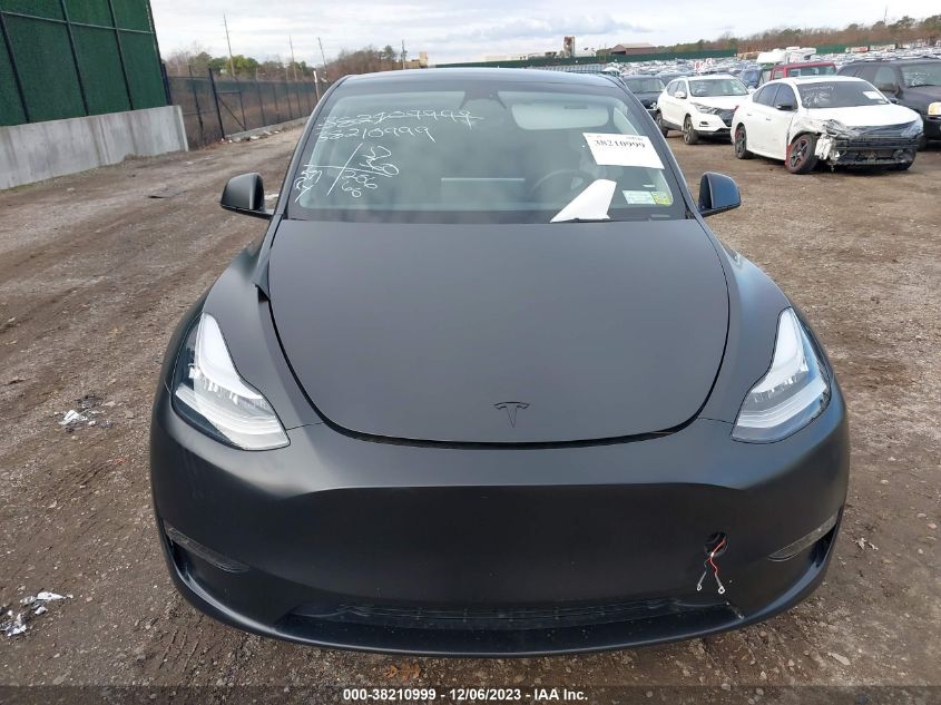 2023 Tesla Model Y VIN: 7SAYGDEE0PA031612 Lot: 38210999