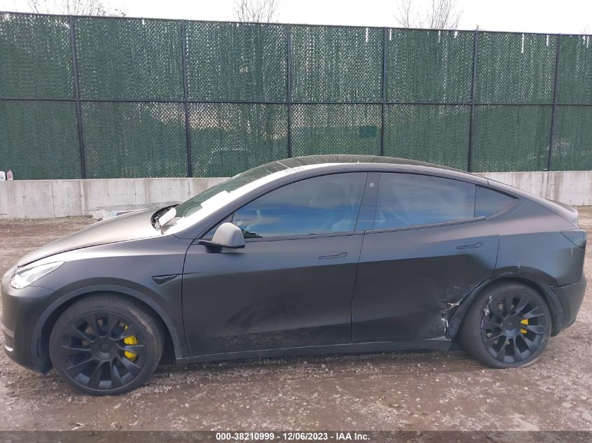 2023 Tesla Model Y VIN: 7SAYGDEE0PA031612 Lot: 38210999