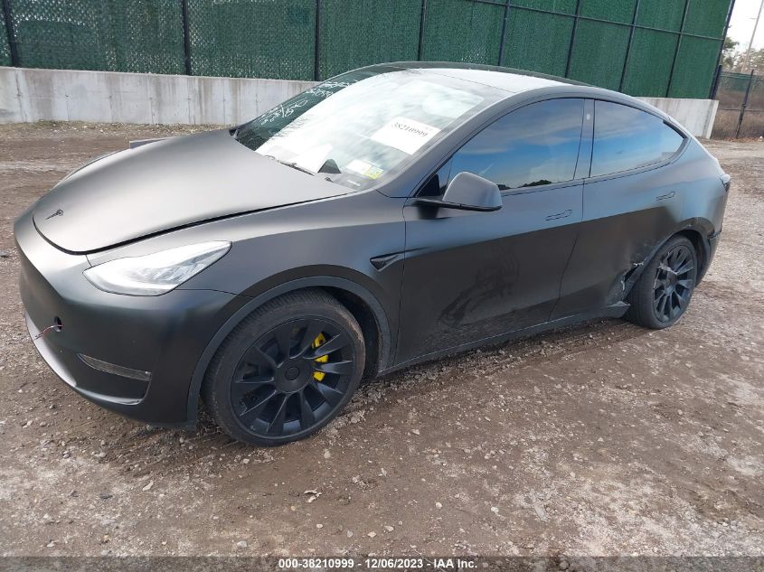 2023 Tesla Model Y VIN: 7SAYGDEE0PA031612 Lot: 38210999