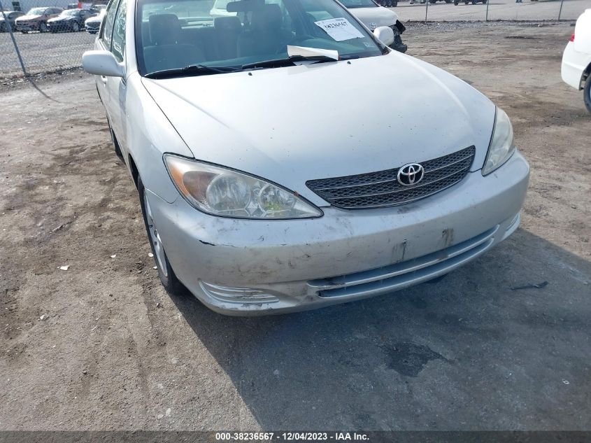 2002 Toyota Camry Le VIN: 4T1BE32K72U093813 Lot: 38236567