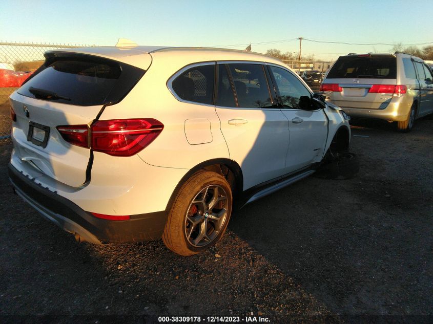 2018 BMW X1 xDrive28I VIN: WBXHT3C38J5F90959 Lot: 38309178