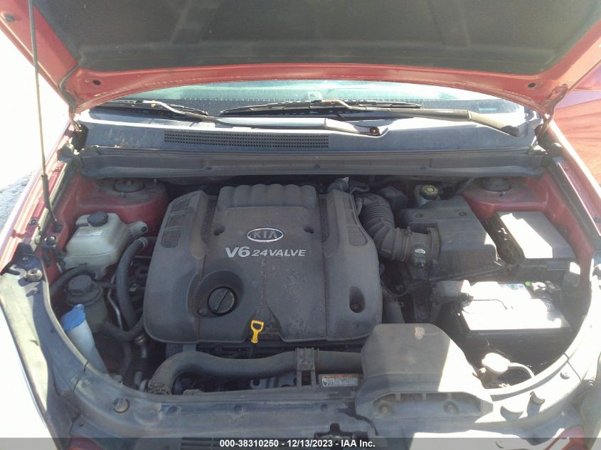 2007 Kia Rondo Lx V6 VIN: KNAFG526677097174 Lot: 38310250