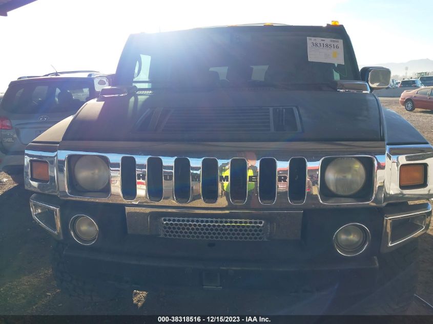 2003 Hummer H2 VIN: 5GRGN23U03H104499 Lot: 38318516