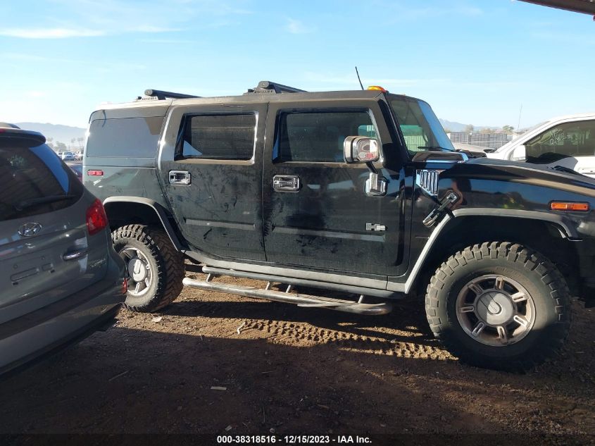 2003 Hummer H2 VIN: 5GRGN23U03H104499 Lot: 38318516