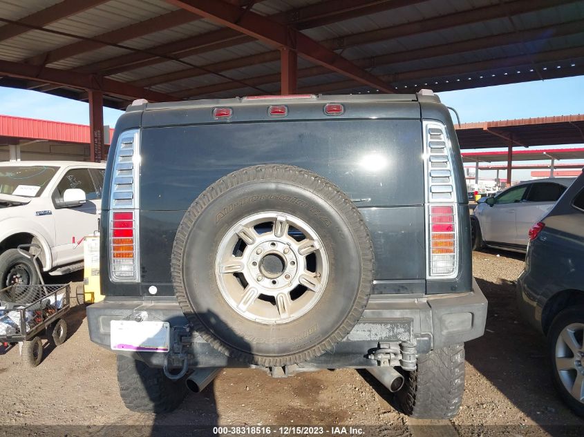 2003 Hummer H2 VIN: 5GRGN23U03H104499 Lot: 38318516