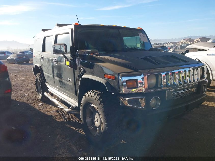 2003 Hummer H2 VIN: 5GRGN23U03H104499 Lot: 38318516