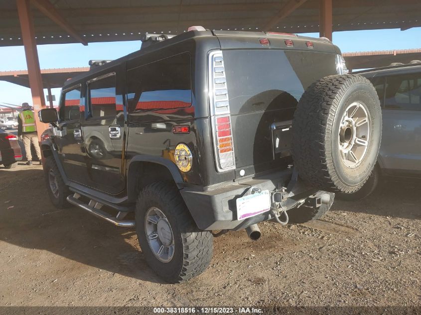 2003 Hummer H2 VIN: 5GRGN23U03H104499 Lot: 38318516