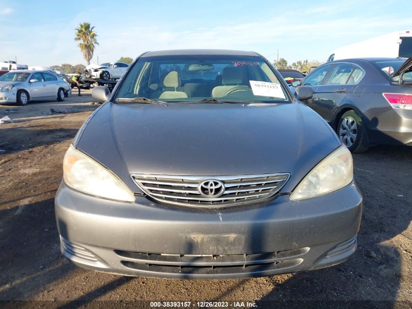 2002 Toyota Camry Le VIN: 4T1BE30K72U565270 Lot: 38393157