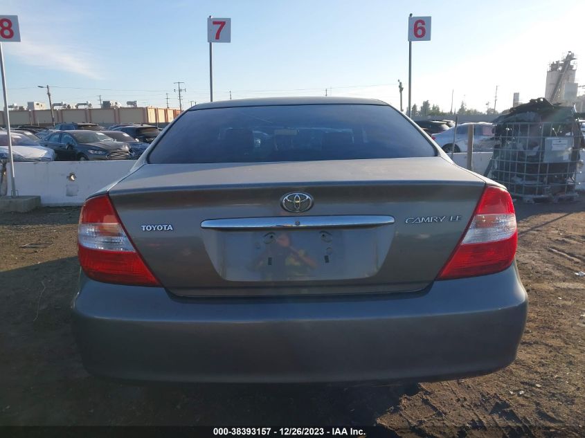 2002 Toyota Camry Le VIN: 4T1BE30K72U565270 Lot: 38393157