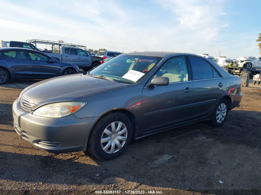 2002 Toyota Camry Le VIN: 4T1BE30K72U565270 Lot: 38393157