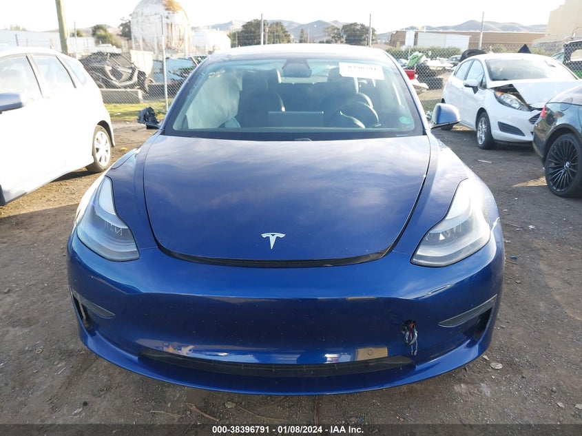2021 Tesla Model 3 Standard Range Plus Rear-Wheel Drive VIN: 5YJ3E1EAXMF876328 Lot: 38396791