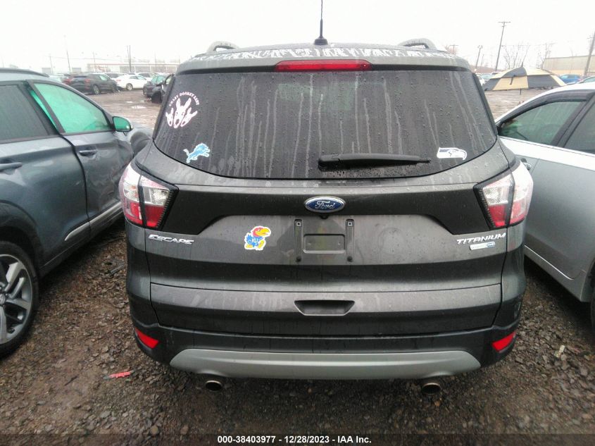 2017 Ford Escape Titanium VIN: 1FMCU9J94HUD86599 Lot: 38403977