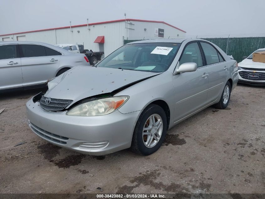 2002 Toyota Camry Le VIN: 4T1BE32K32U587795 Lot: 38423882