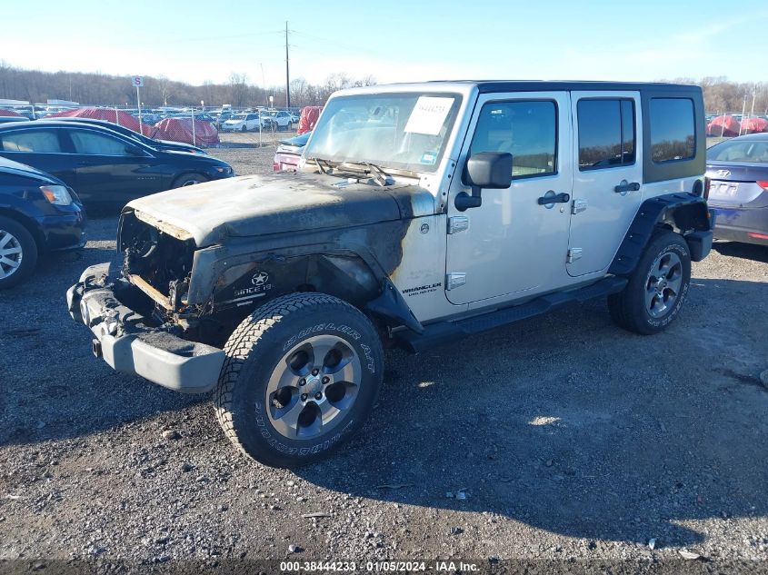 2009 Jeep Wrangler Unlimited Sahara VIN: 1J4GA59129L772316 Lot: 38444233