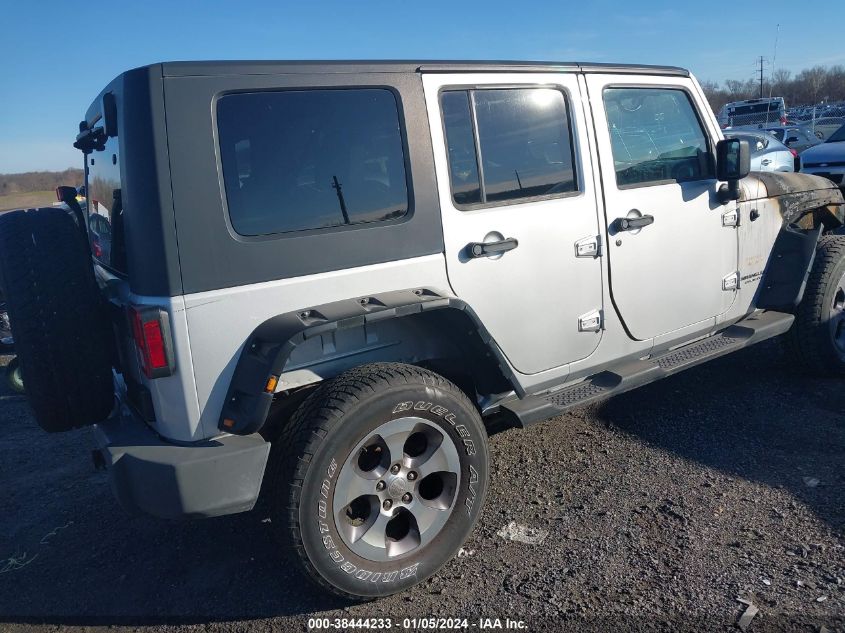 2009 Jeep Wrangler Unlimited Sahara VIN: 1J4GA59129L772316 Lot: 38444233