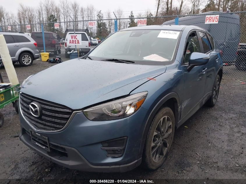 2016 Mazda Cx-5 Grand Touring VIN: JM3KE4DY3G0709623 Lot: 38456220