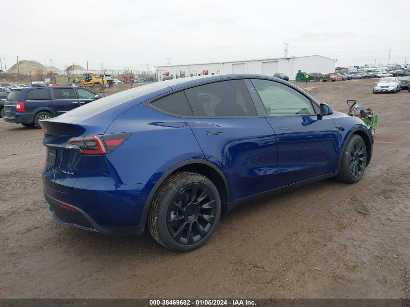 2023 Tesla Model Y Awd/Long Range Dual Motor All-Wheel Drive VIN: 7SAYGDEE7PA195701 Lot: 38469682