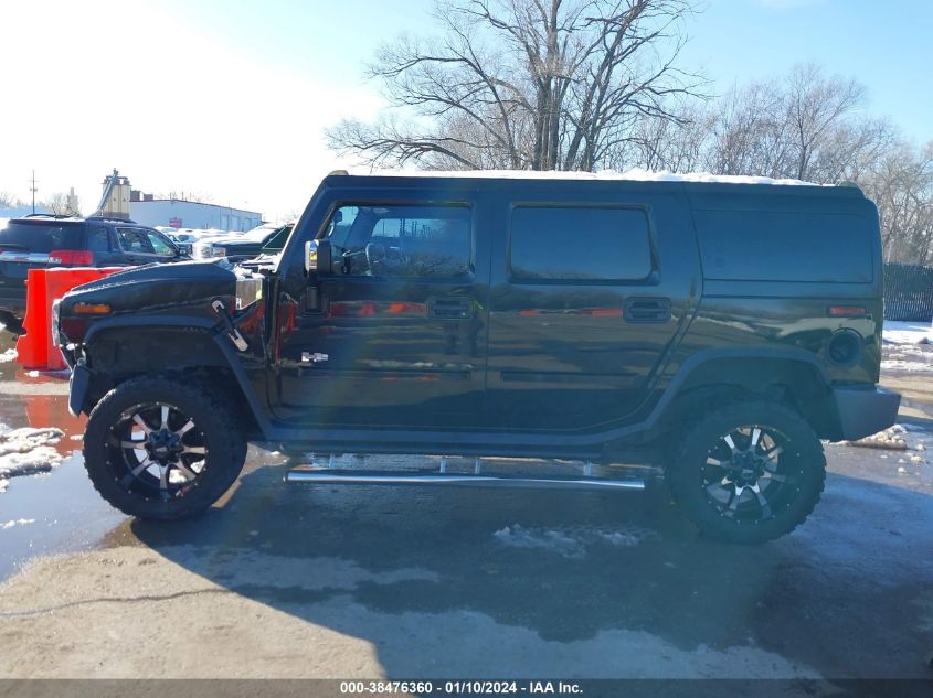 2003 Hummer H2 VIN: 5GRGN23U63H148586 Lot: 38476360