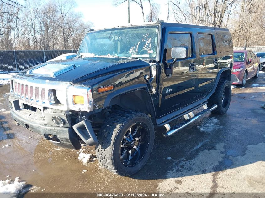 2003 Hummer H2 VIN: 5GRGN23U63H148586 Lot: 38476360