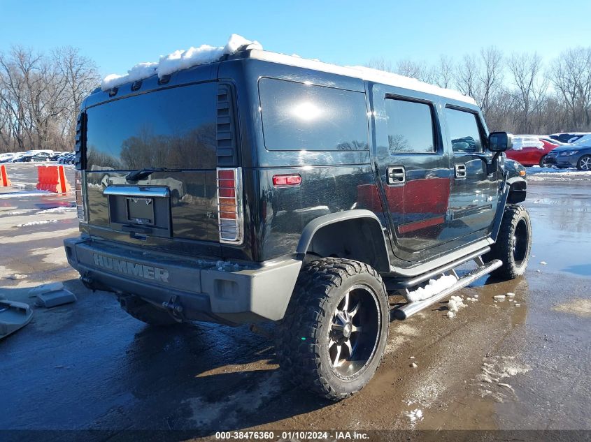 2003 Hummer H2 VIN: 5GRGN23U63H148586 Lot: 38476360