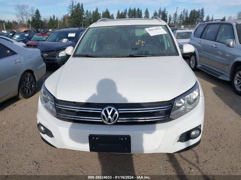 2014 Volkswagen Tiguan Sel VIN: WVGAV3AX7EW551805 Lot: 38524033