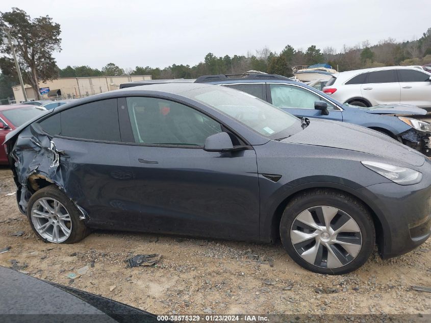 2023 Tesla Model Y Awd/Long Range Dual Motor All-Wheel Drive VIN: 7SAYGAEE1PF589292 Lot: 38575329