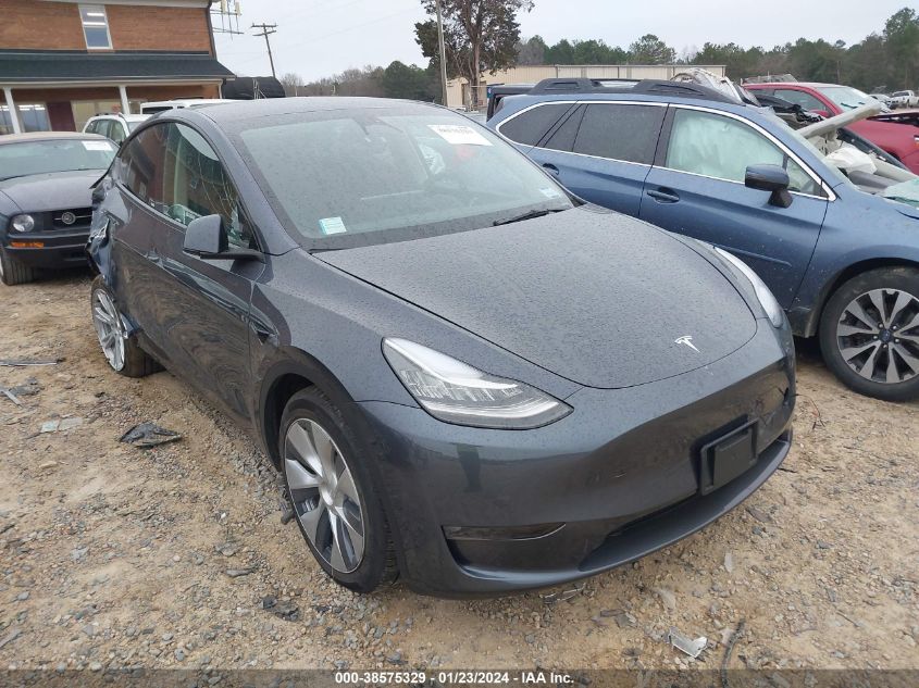 2023 Tesla Model Y Awd/Long Range Dual Motor All-Wheel Drive VIN: 7SAYGAEE1PF589292 Lot: 38575329