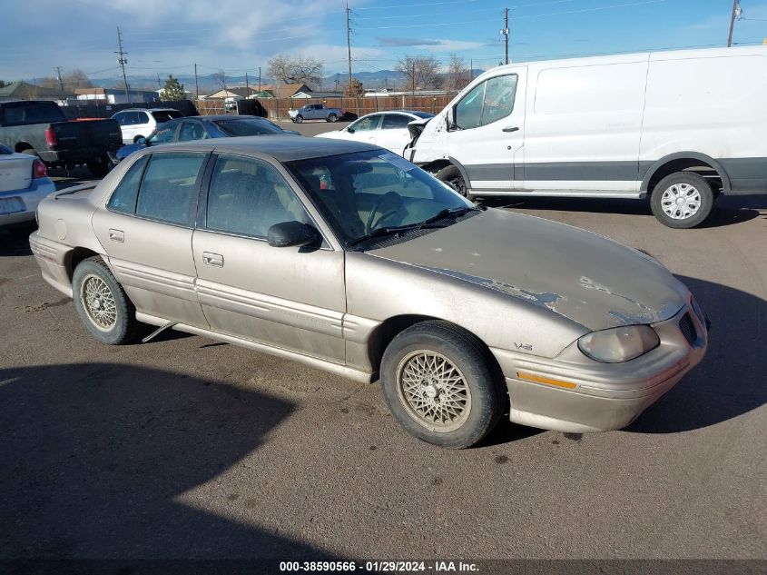 1997 Pontiac Grand Am Se VIN: 1G2NE52M1VC709602 Lot: 38590566