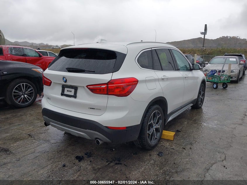 2018 BMW X1 xDrive28I VIN: WBXHT3C37J5L28038 Lot: 38655947