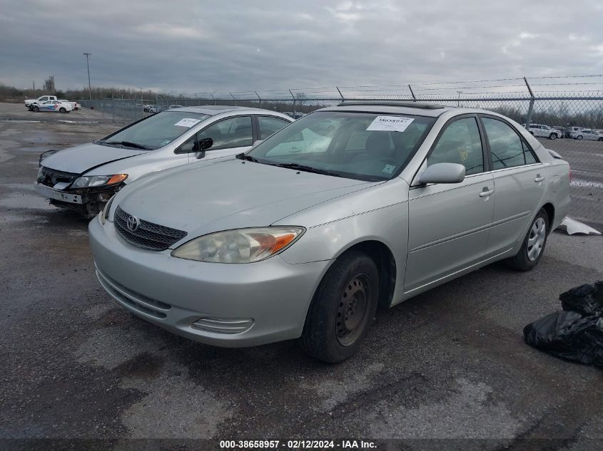 2002 Toyota Camry Le VIN: JTDBE30K220043481 Lot: 38658957