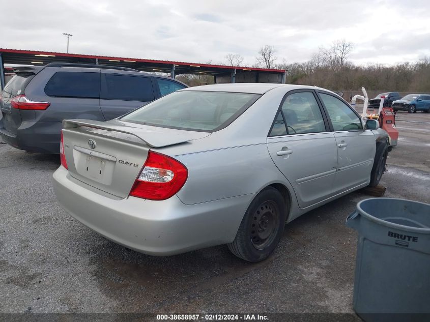 2002 Toyota Camry Le VIN: JTDBE30K220043481 Lot: 38658957