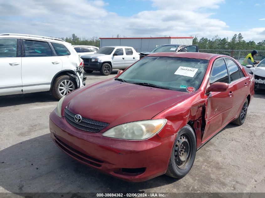 2003 Toyota Camry Le VIN: JTDBE32K430217839 Lot: 38694362